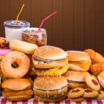 51637650 – multiple type of fast food on table.
