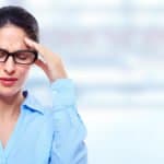 35721367 – woman having migraine headache.